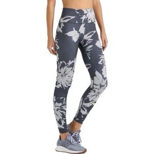 Vuori Women's Clean Elevation Leggings in a black with a grey/white floral print